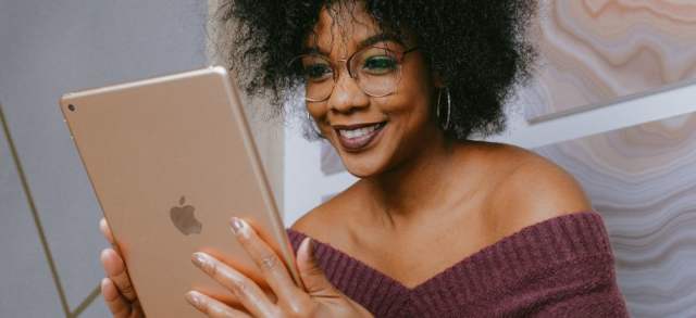 Woman holding an iPad