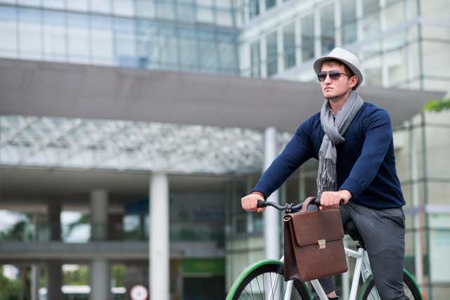Stylish man on bicycle