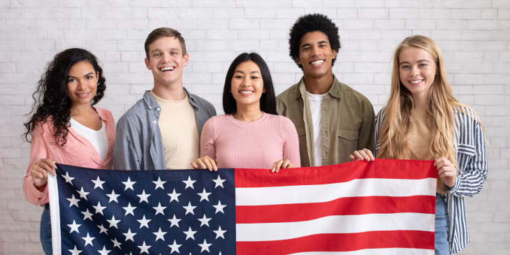PhD students with a US flag