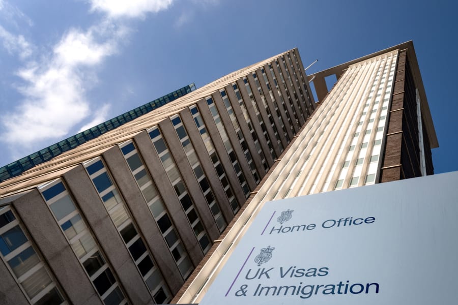 British immigration concept with Lunar House building the Home Office Visas and Immigration Office in Greater London, England, UK