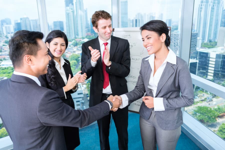 Business team applause in meeting