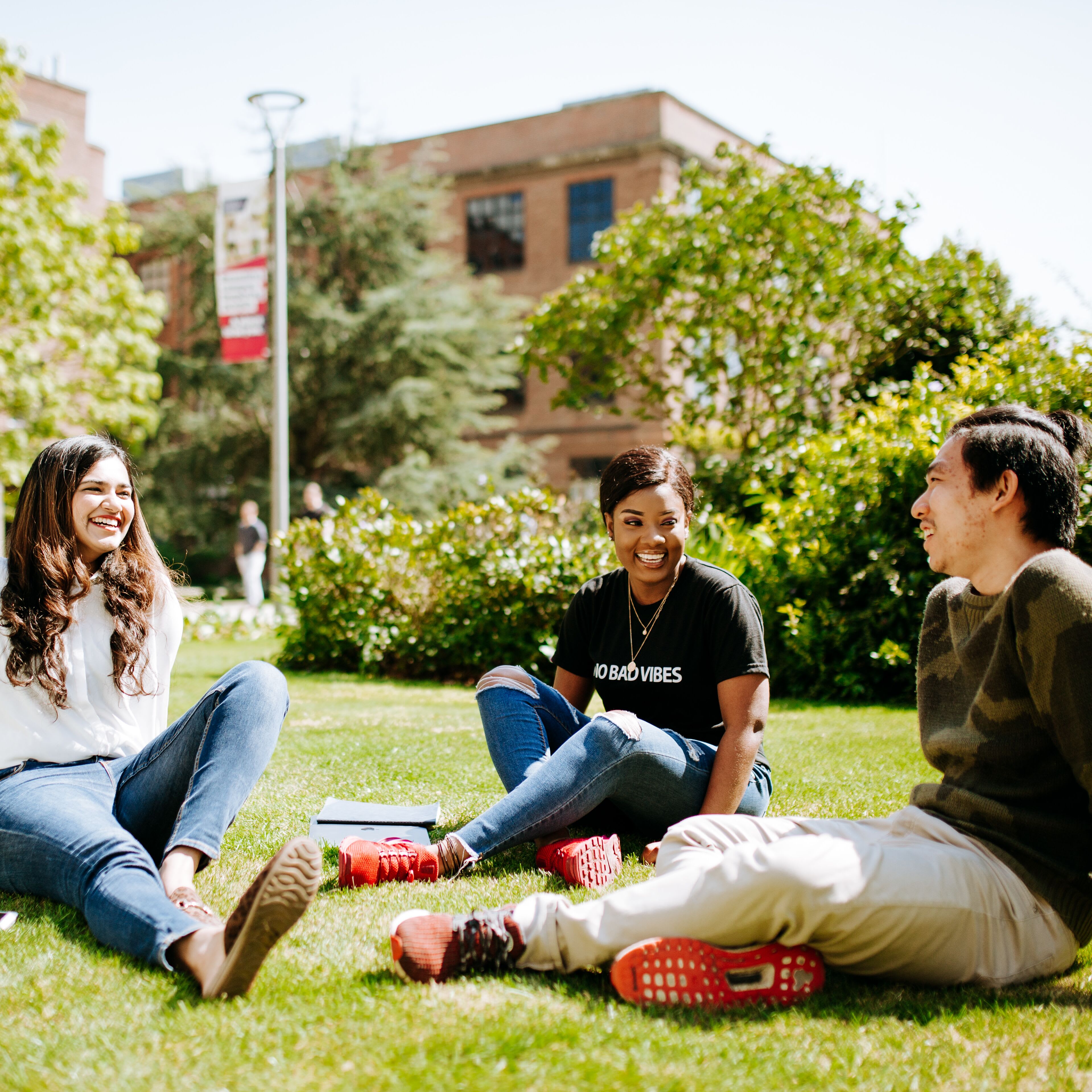 122372_InternationalStudentAmbassadorsSatChattingonGrass-219crop.jpeg