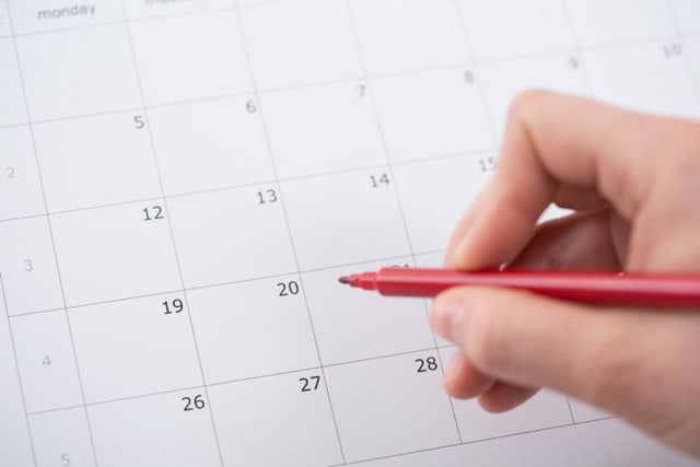 Marking important interview in calendar with red marker