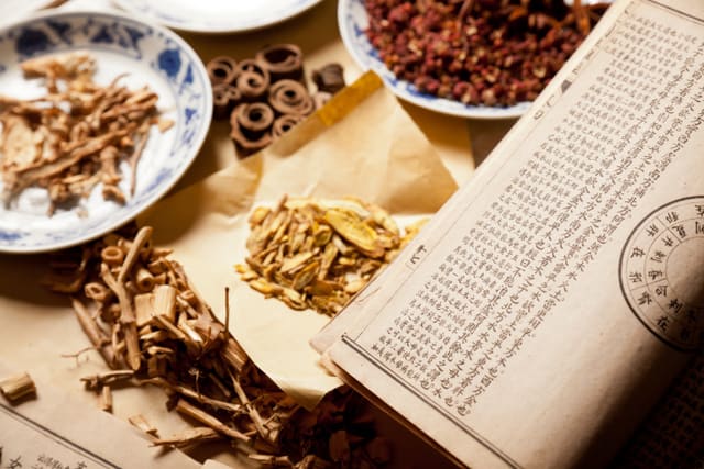 Ancient Chinese medical books in the Qing Dynasty, the Chinese herbal medicine on the table