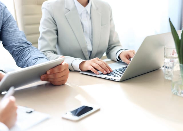 Business adviser analyzing financial figures denoting the progress in the work of the company