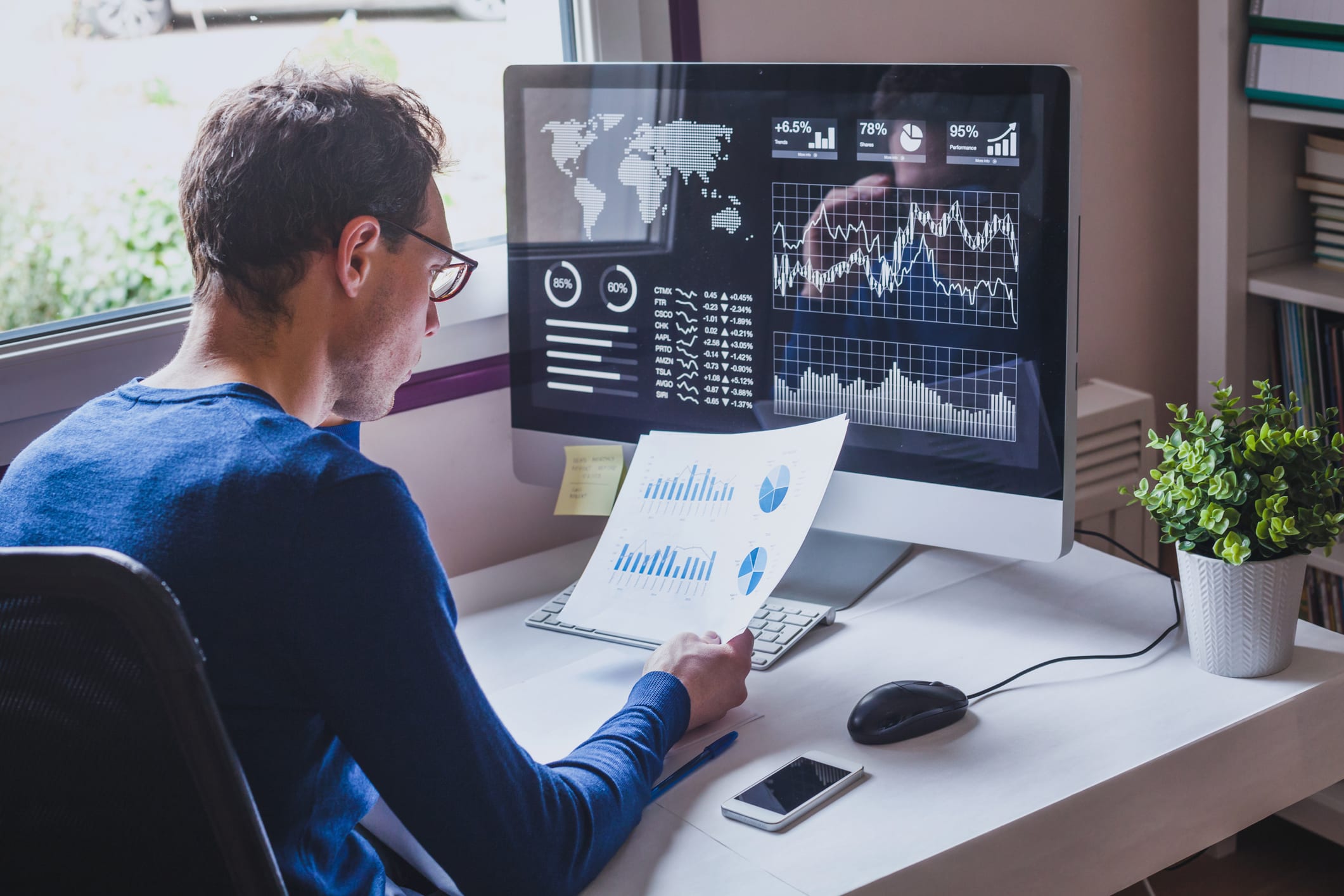 entrepreneur reading financial report on dashboard, fintech and audit concept