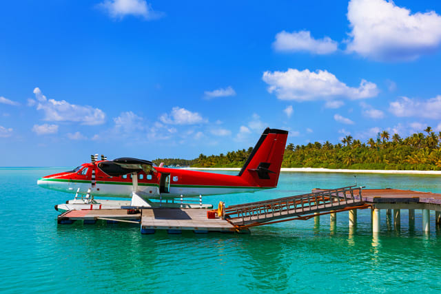 Seaplane at Maldives - nature travel background