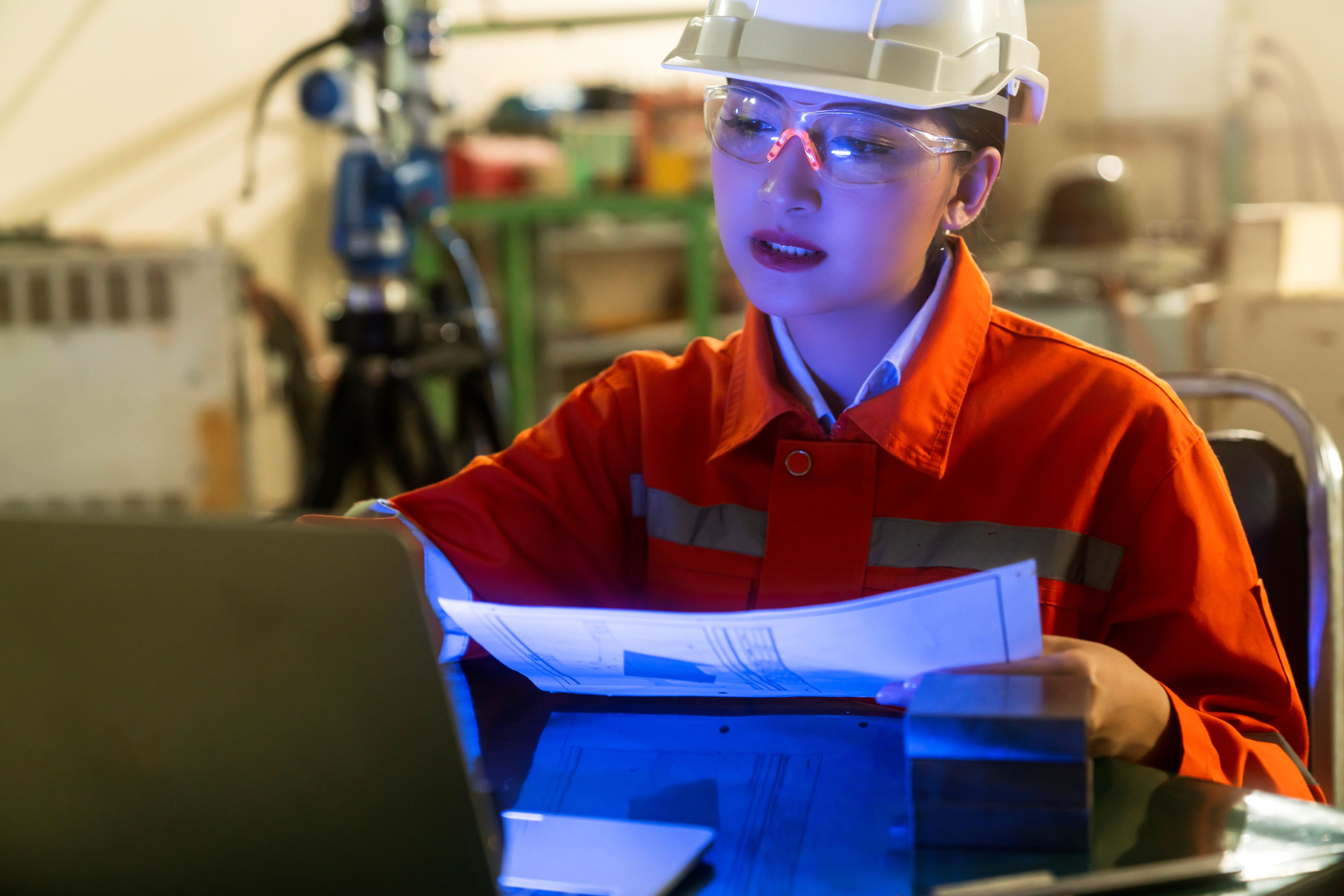 247805_asian-female-engineer-specialist-with-measuring-machine-with-manipulator-arm-laptopthreedimensional-coordinate-measurement-check-sizes-3d-check-sizes-partscmm-after-machining-process.jpg