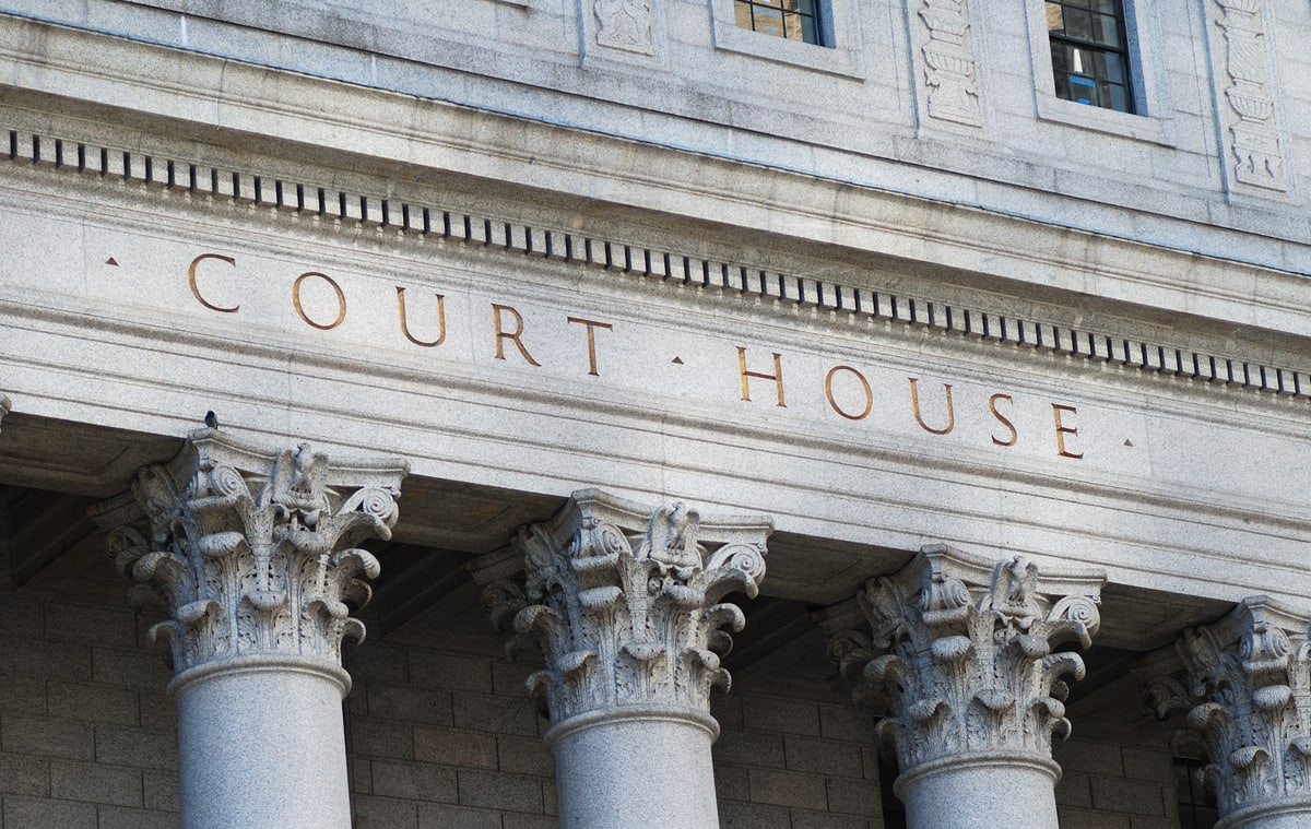 The words Court House outside the Supreme Court