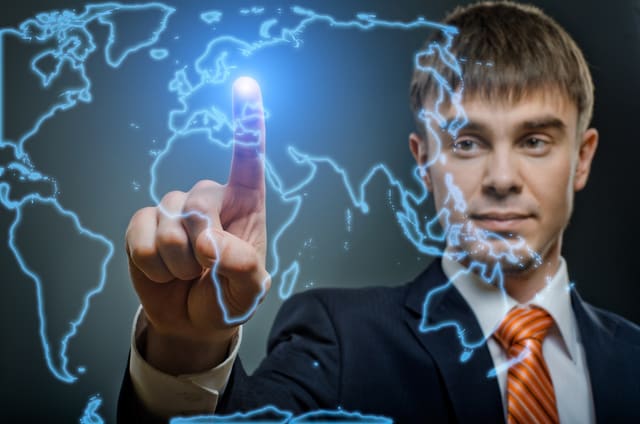 handsome businessman  finger point touch on world map, on dark blue background
