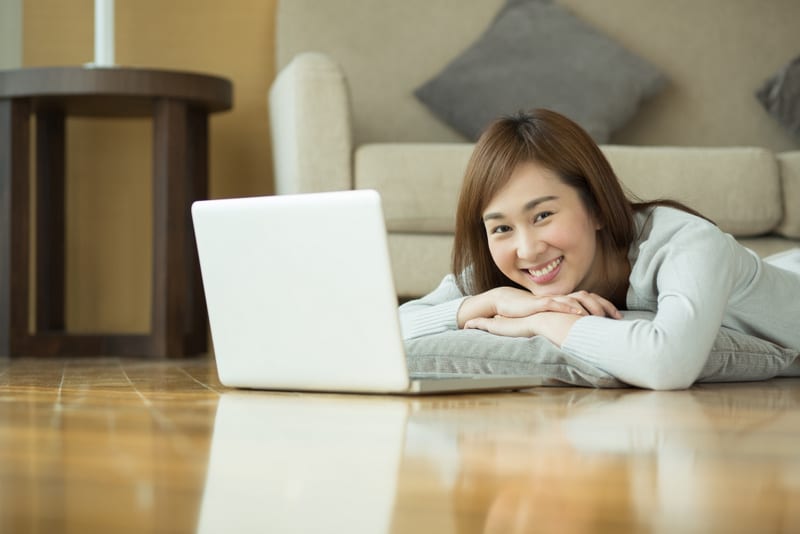 Asian woman using laptop