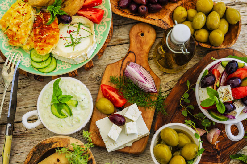 Greek cuisine dishes - Greek salad, choriatiki, halloumi, tzatziki