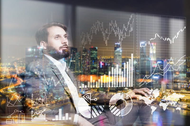 Sitting businessman and business charts on Singapore background. Double exposure