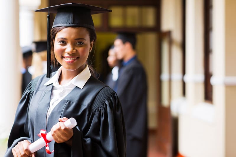 smart female african university graduate on graduation day