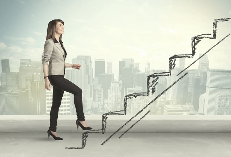 Business woman climbing up on hand drawn staircase concept on city background