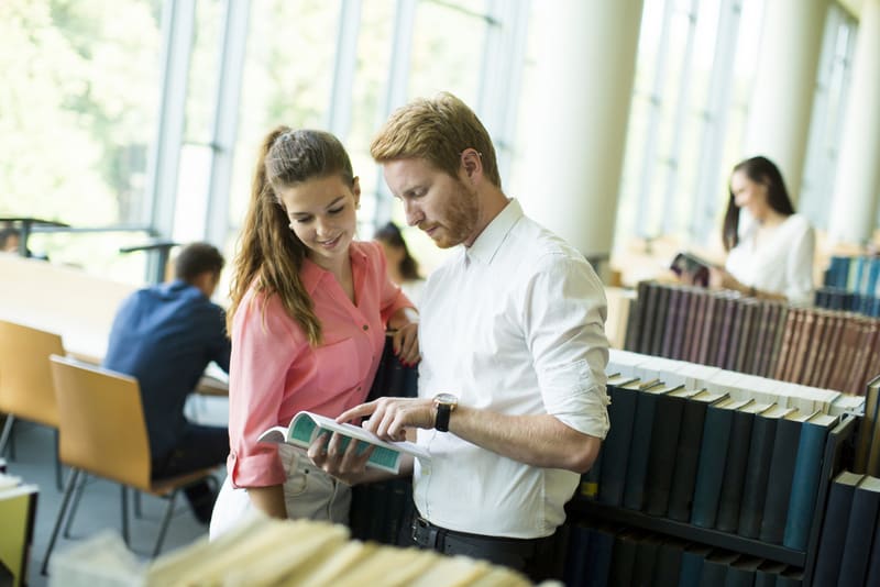 Young couple in the library