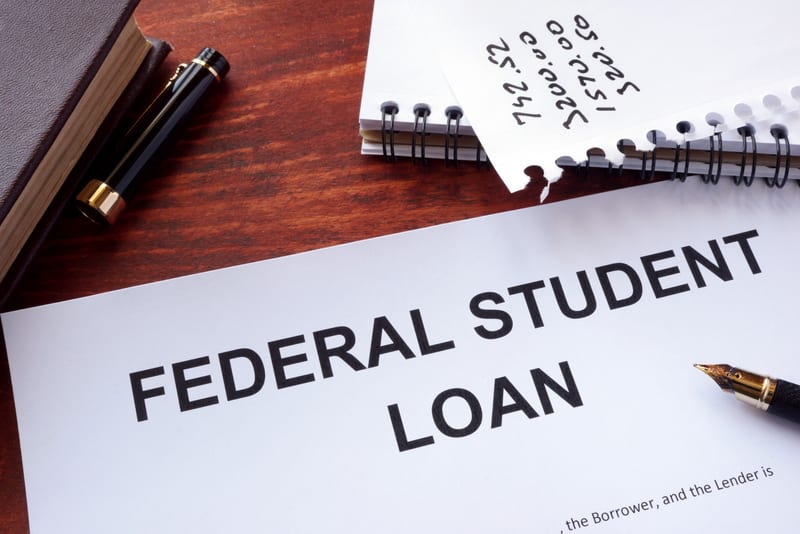 Federal student loan form on a table.