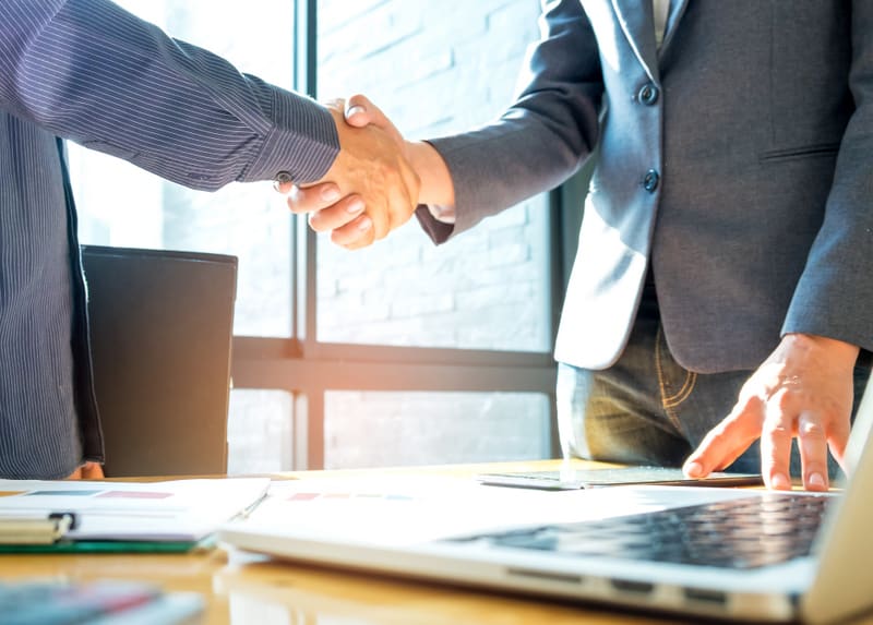 Businessmen shake hands after agreeing,Business success concept.