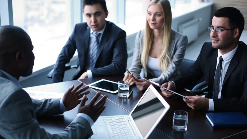 Image of business people interacting at meeting