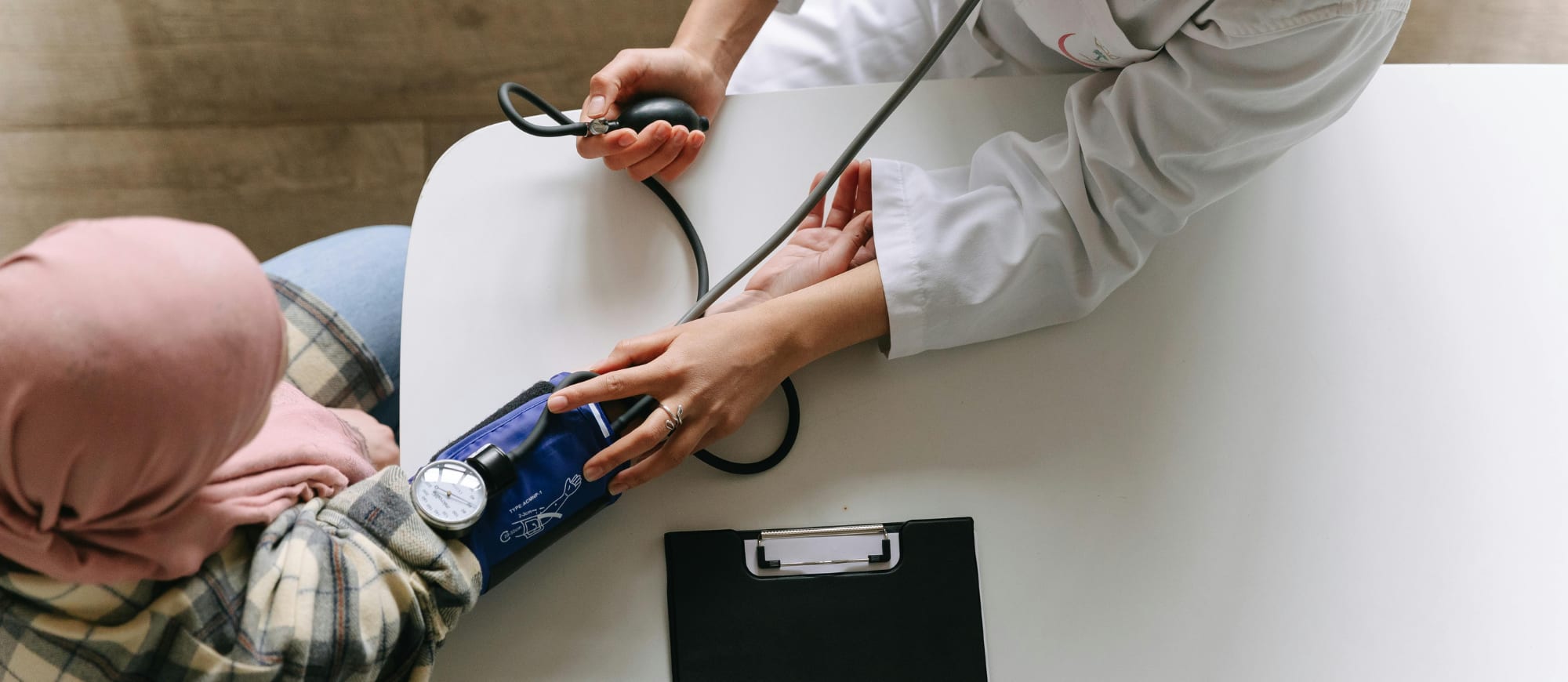 doctor checking patient