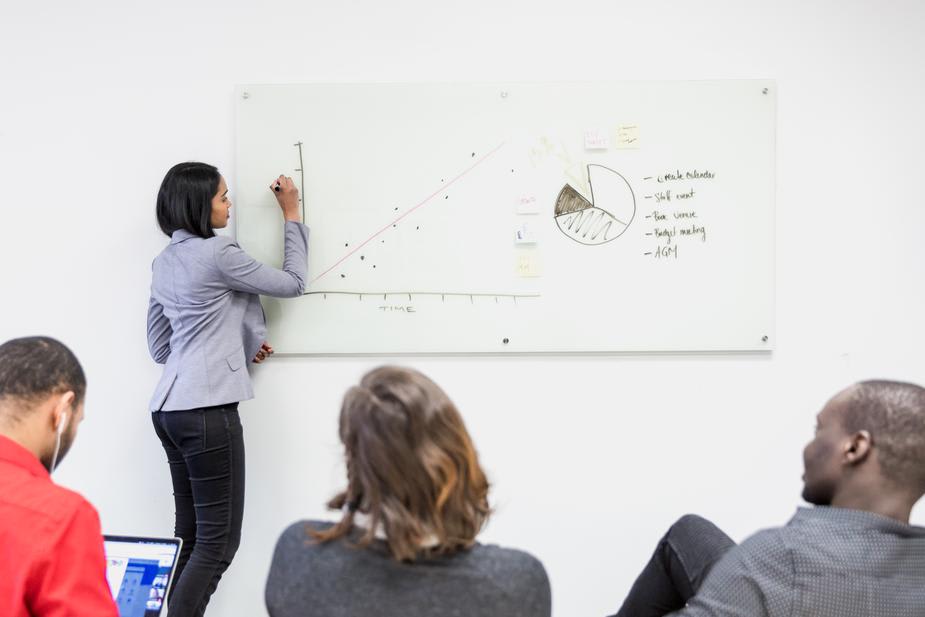 122619_girl-presents-on-whiteboard1.jpg