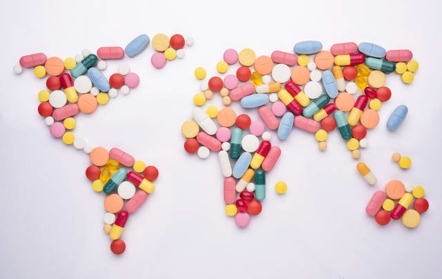 Pills in world map shape
