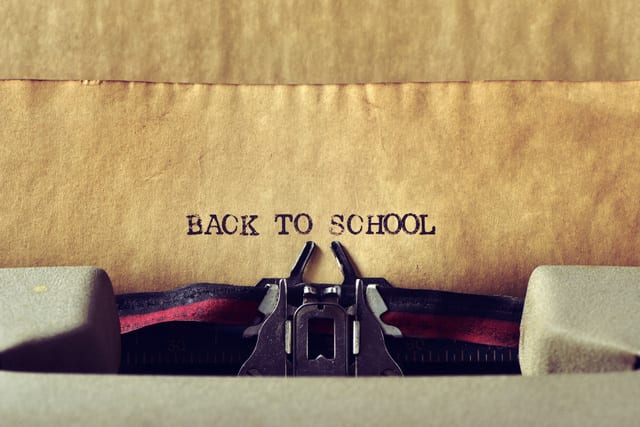 text back to school written with a typewriter