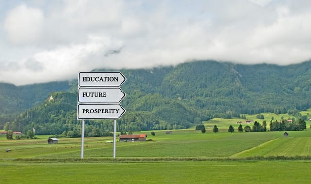 Road sign to  education,future,prosperity