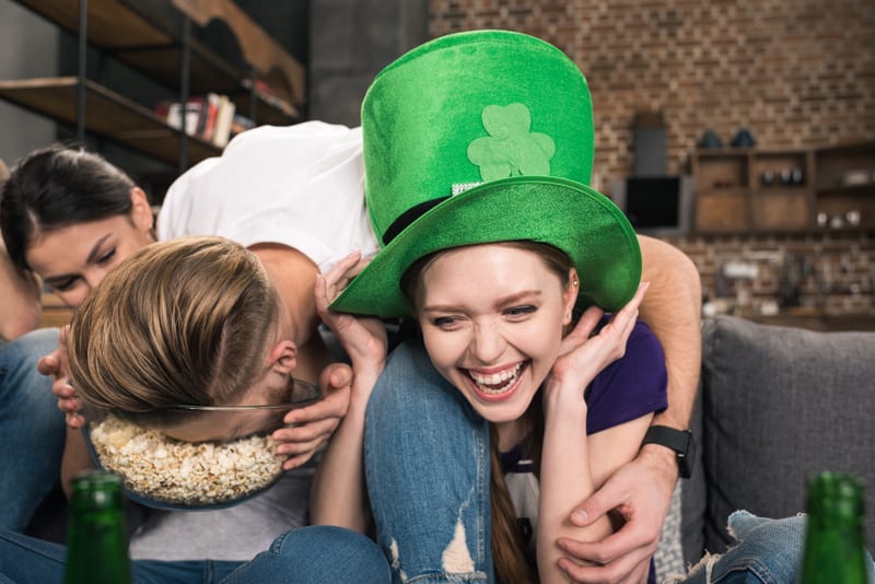 Young friends having fun during celebration of st patricks day
