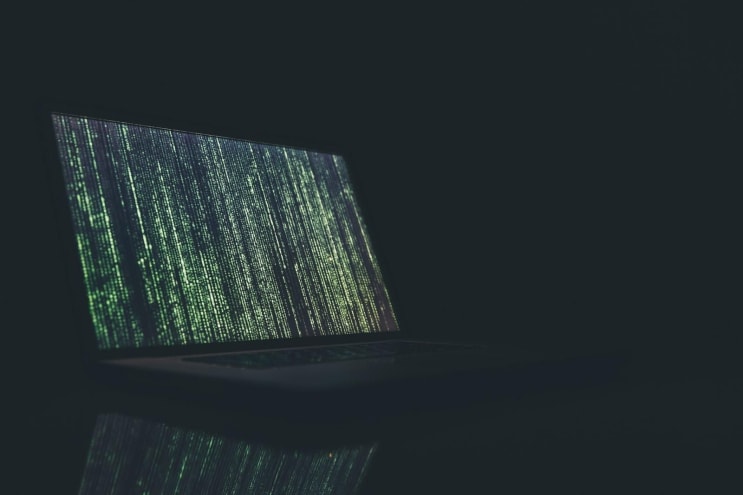 black and gray laptop computer turned on black and gray laptop computer turned on