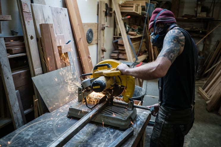 Man doing metalwork Man doing metalwork