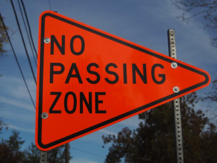 Traffic signage for "No Passing Zone seen Nov. 4, 2021, at the one-lane South Park Road bridge in Sanatoga PA